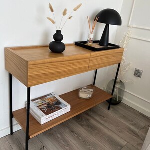 JANINE - consoletafel met lades en plank voor de hal, consoletafel met lades, commode, kaptafel, eikenfineer, zwart frame