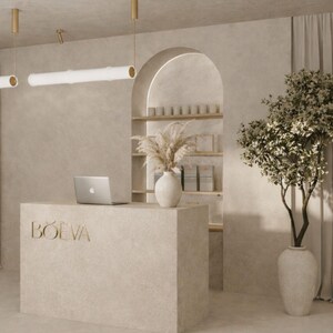 Moderne beige Beauty-Rezeption mit Logo. Empfangstisch, Theke RAYS