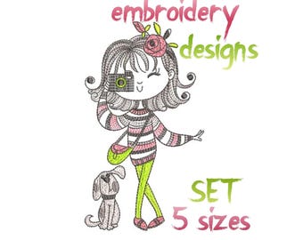 May include: Embroidery design of a girl with a camera and a dog. The design is available in 5 sizes. The text "embroidery designs" and "SET 5 sizes" is included in the image.