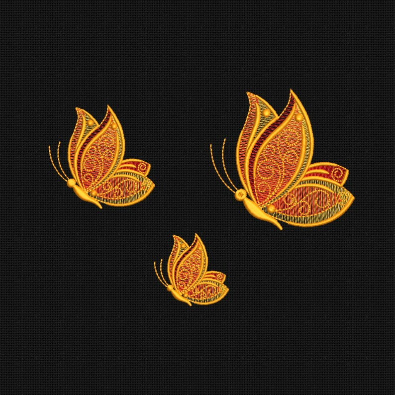 May include: Three embroidered butterflies in gold and red on a black background. The butterflies are different sizes and have intricate designs.