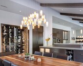 Kitchen island lighting or, this modern light fixture, is elegant yet cozy