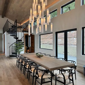 Modern Lighting For Dining Room. Dine Room Chandelier Lighting. Hanging Lamp for Dining Lighting. Long Chandelier to fill High Ceiling space