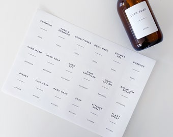 May include: White printable labels with black text for various household products. The labels include names like "Shampoo", "Conditioner", "Body Wash", "Shower Gel", "Bubbles", "Hand Wash", "Hand Soap", "Hand Gel", "Hand Sanitizer", "Hand Lotion", "Bathroom Spray", "Dishes", "Dish Soap", "Hand Wash", "Soap", "Kitchen Spray", and "Plant Spray".
