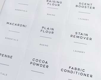 May include: Nine white square labels with black text. The labels are for various kitchen and laundry items. The labels include: Fusilli, Self Raising Flour, Scent Booster, Macaroni, Plain Flour, Stain Remover, Penne, Cocoa Powder, and Fabric Conditioner.