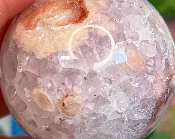 pink amethyst sphere - light lavender-pink base, crystal cavities