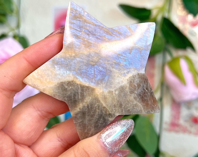 blue flashy moonstone star with sunstone glimmers