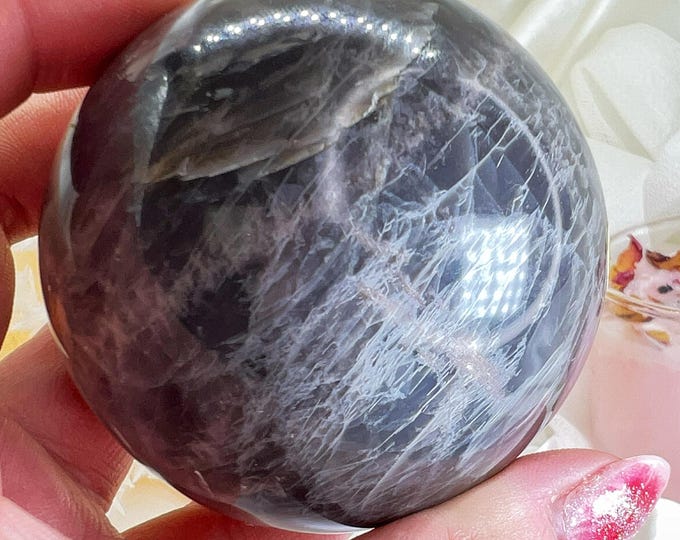 mysterious magical flashy black moonstone crystal sphere