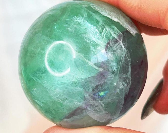 juicy watermelon candy fluorite sphere with snowflake inclusion