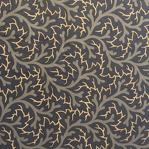 Peut inclure: Un motif de tissu sans couture avec un motif répétitif de feuilles stylisées en or sur un fond gris foncé.