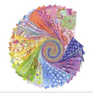 May include: A spiral of colorful fabric squares in a variety of patterns and colors, including floral, polka dots, and geometric designs. The fabric is arranged in a circular pattern, creating a rainbow effect. Ideal for quilting and crafting projects.