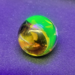 Uranium glass marble, handmade glass marble, black light marble, signed marble