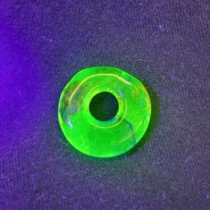 Uranium glass pendant, handmade uranium glass, glowing glass pendant, round glass pendant, pendant that glows in black light