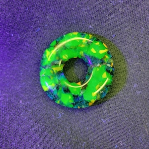 Uranium glass pendant, round glass pendant, glowing glass pendant, glowing glass jewelry, handmade glass jewelry, halloween jewelry