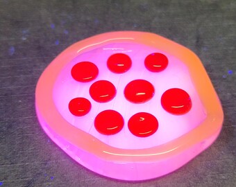 Handmade glowing glass pizza - black light reactive art