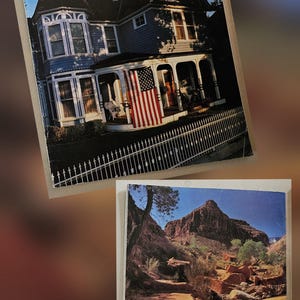 May include: Two vintage Arizona Highways magazines. The top magazine features a blue Victorian home with an American flag. The bottom magazine shows a desert landscape with a rocky trail and mountains.