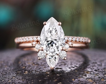 Pear shaped moissanite engagement ring set vintage art deco diamond curved band rose gold half eternity milgrain bridal set anniversary ring