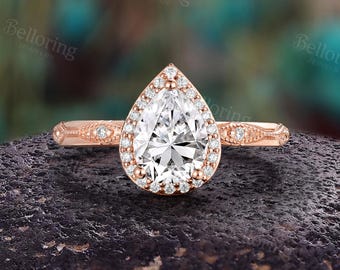 Unik förlovningsring med päronmoissanit: Elegant Halo-jubileumsring i 14 karat roséguld