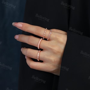 a woman's hand with a ring on it