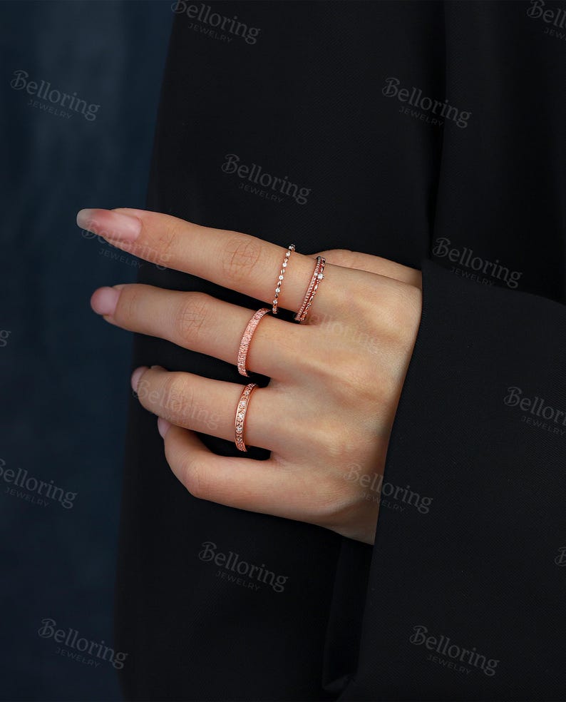 a woman's hand with a ring on it