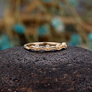 a close up of a ring on a rock