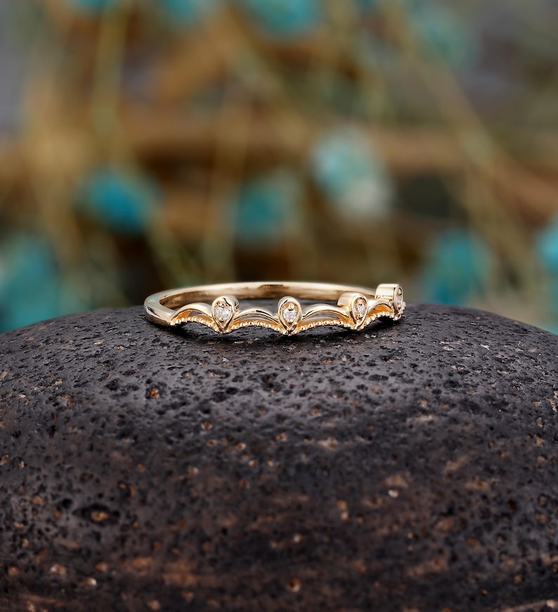 a close up of a ring on a rock