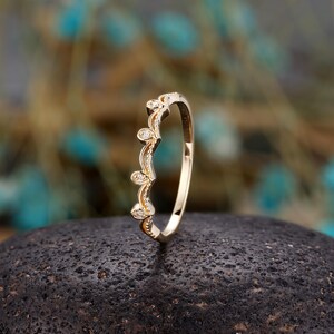 a close up of a ring on a rock