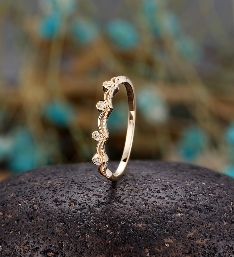 a close up of a ring on a rock