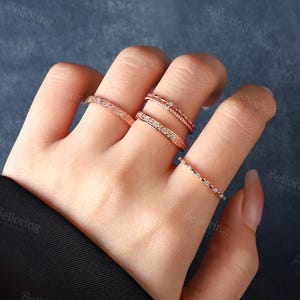 a woman's hand with a ring on it