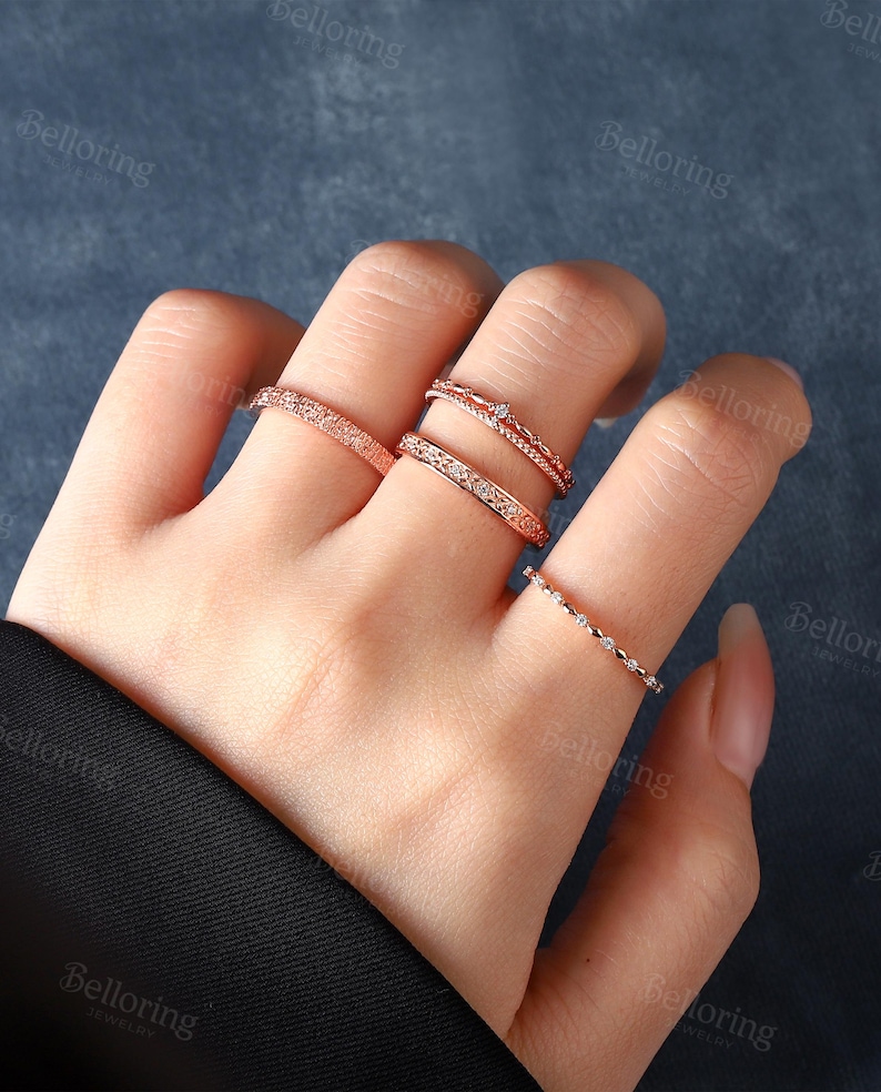 a woman's hand with a ring on it