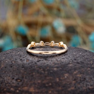 a close up of a ring on a rock