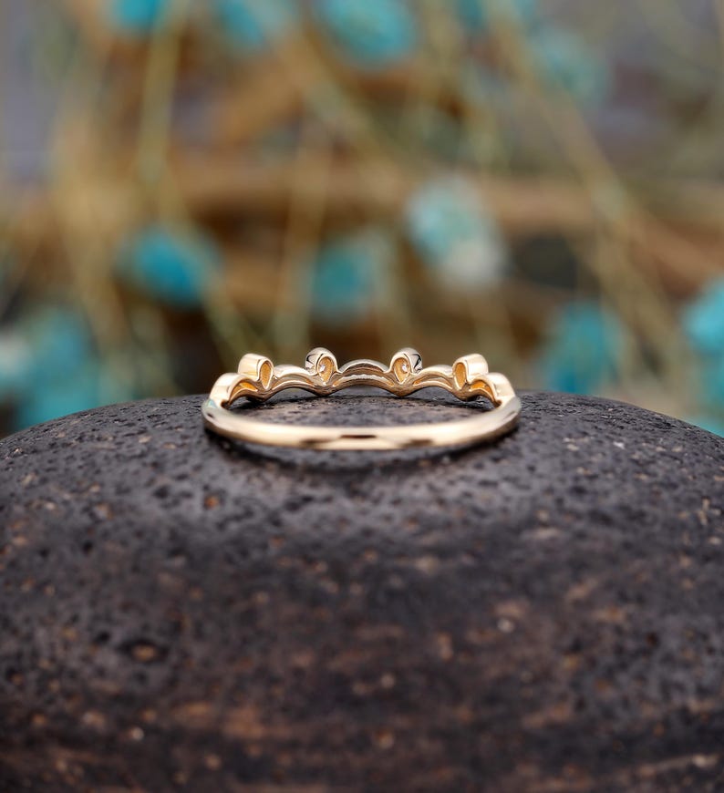a close up of a ring on a rock