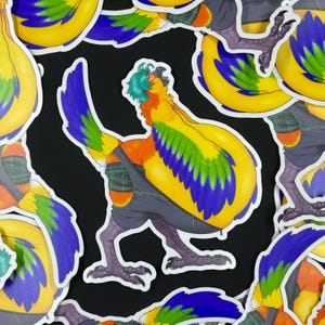 May include: A collection of stickers depicting a cartoon parrot-like creature. The creature has yellow, blue, green, and orange feathers, with teal hair and dark grey overalls. The stickers are on a black background.