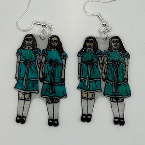 Shining twins dangling earrings
