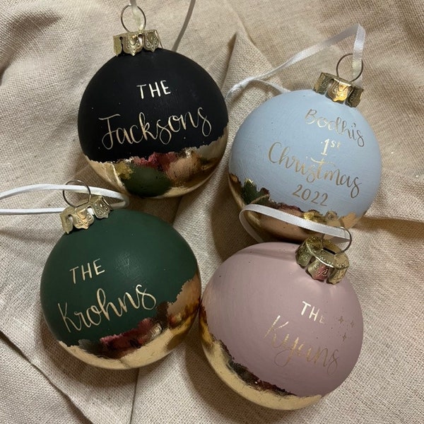 Personalised, hand painted, hand lettered ceramic bauble Christmas hanging decoration with gold leaf gilding