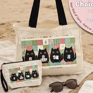 May include: A cream-colored canvas tote bag and a matching zippered cosmetic bag, both featuring a quilted-style patch with four black cats playing mahjong. The bags have black handles and straps, and the text Choice of Tote Bag OR Cosmetic Bag.
