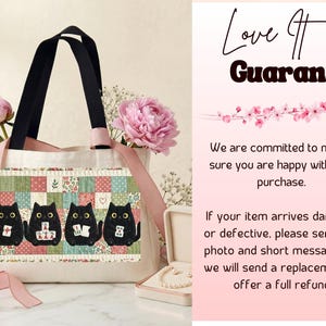 May include: A cream-colored canvas tote bag featuring a rectangular patch with a patchwork quilt pattern and four black cats holding mahjong tiles. The bag has black handles and light pink ribbons. Text on the right reads Love It Guarantee.