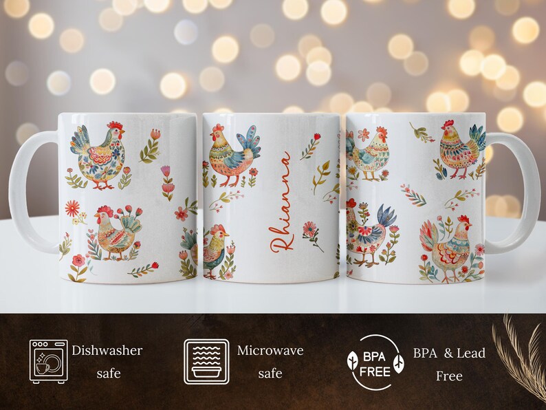 May include: Three white ceramic mugs with a colorful rooster pattern and floral accents. The mug in the center has the name "Rhianna" written on it. The mugs are dishwasher and microwave safe and BPA and lead free.