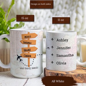 May include: White ceramic mug with a travel-themed design. The mug features a map with a plane and directional signs that read "Mexico", "Bahamas", "Hawaii", and "Canada". The mug also has the text "2025 Travel Diaries". The other side of the mug has a list of names: Ashley, Jennifer, Samantha, and Olivia.