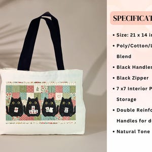 May include: A natural tone tote bag featuring a patchwork design with four black cats holding mahjong tiles. The bag has black handles, a black zipper, and measures 21 by 14 inches. It includes a 7 by 7 inch interior pocket and reinforced handles.