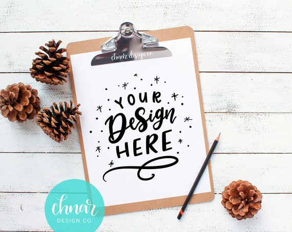 Clipboard Flatlay Mockup With Pinecones On Wood Background