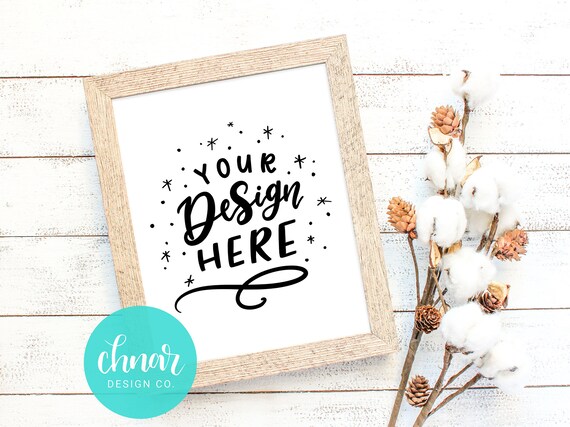 Frame Mockup Up With Cotton And Pinecones Styled