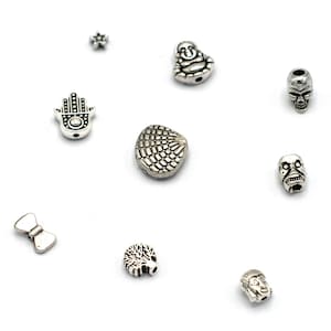 Perla espaciadora de metal plateado