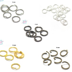 Puede incluir: Surtido de anillas de salto de 6 mm en plata, negro, oro y bronce. Las anillas de salto son un suministro popular para la elaboración de joyas.