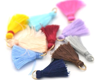 10 pompoms in silk thread 25 mm / golden ring, assortment of colors