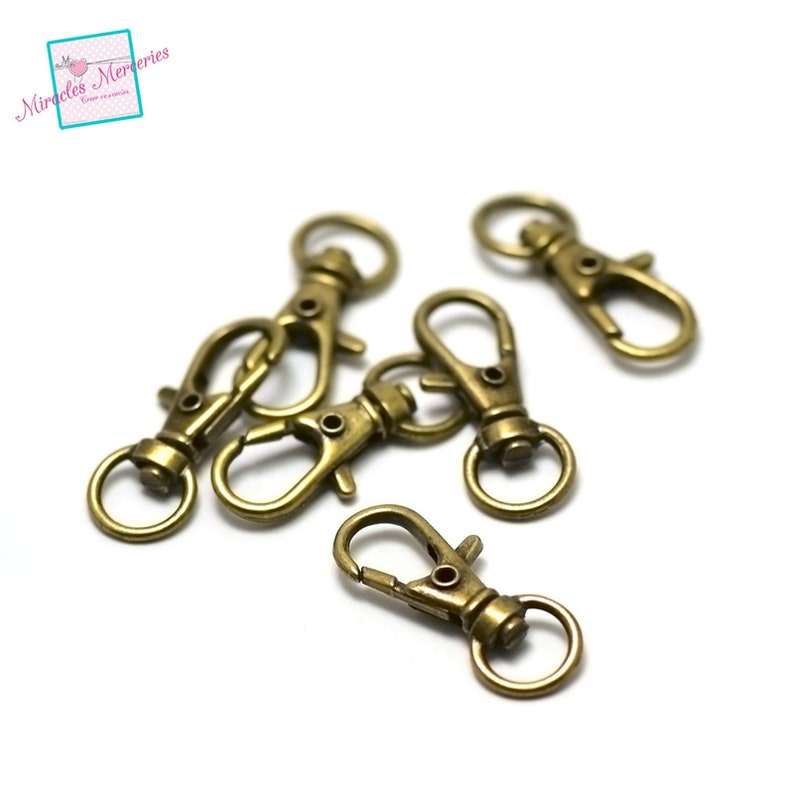 10 porte-clef/clé mousquetons pivotants , 32x12 mm, argenté / doré / bronze/ gun-métal Bronze