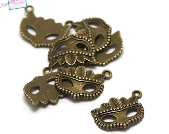 10 "mask 21x15 mm" charms, bronze