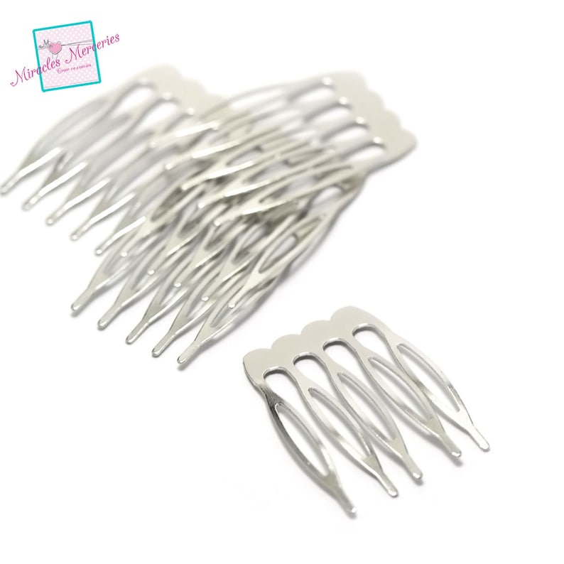May include: A set of ten silver hair combs. The combs are small and have five teeth each. They are perfect for holding hair in place.