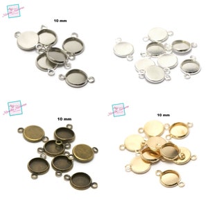 Peut inclure: Un ensemble de 10 mm de cabochons ronds en métal avec une boucle de chaque côté. Les cabochons sont disponibles en argent, bronze et or.
