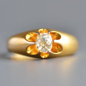 Antique Edwardian period elongated old mine cut diamond solitaire unisex ring in 14k gold