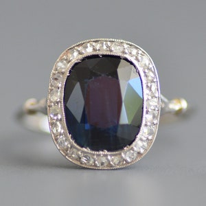 HOLD - Antique Edwardian period cushion cut sapphire with rose cut diamond halo ring in platinum